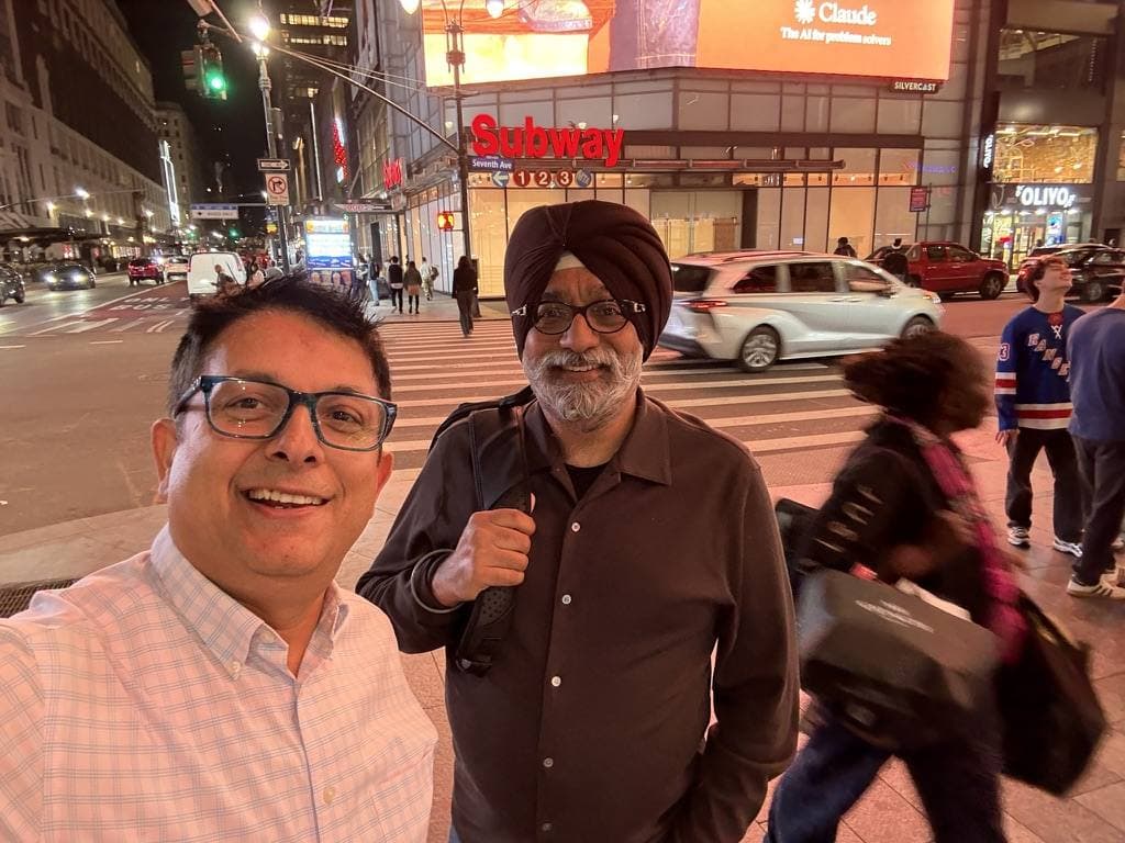 Aruneesh Salhotra with a colleague at a Las Vegas conference
