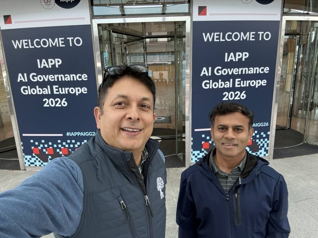 Aruneesh Salhotra with a colleague by the IAPP AI Governance Global Europe 2026 welcome banner in Dublin