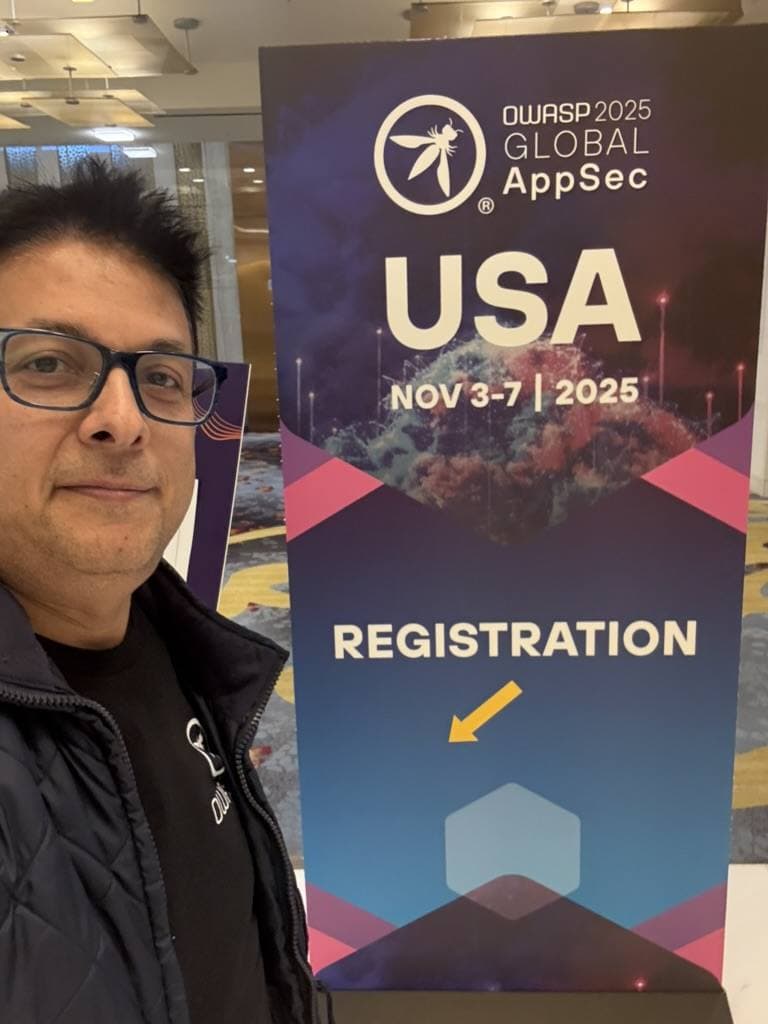 Aruneesh Salhotra by the OWASP Global AppSec USA 2025 registration banner in Washington, DC