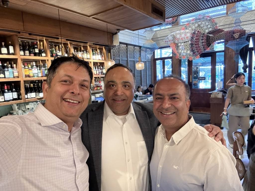 Aruneesh Salhotra with colleagues at a networking event during RSAC 2026 week
