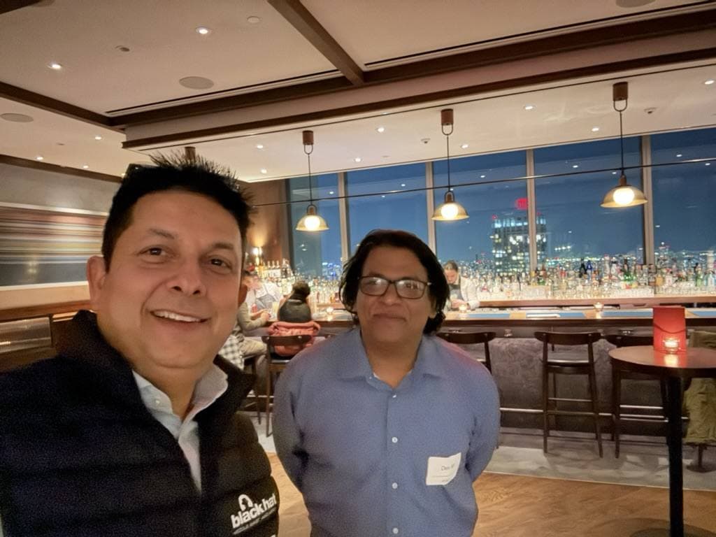 Aruneesh Salhotra with a colleague at an evening event during RSAC 2026 week