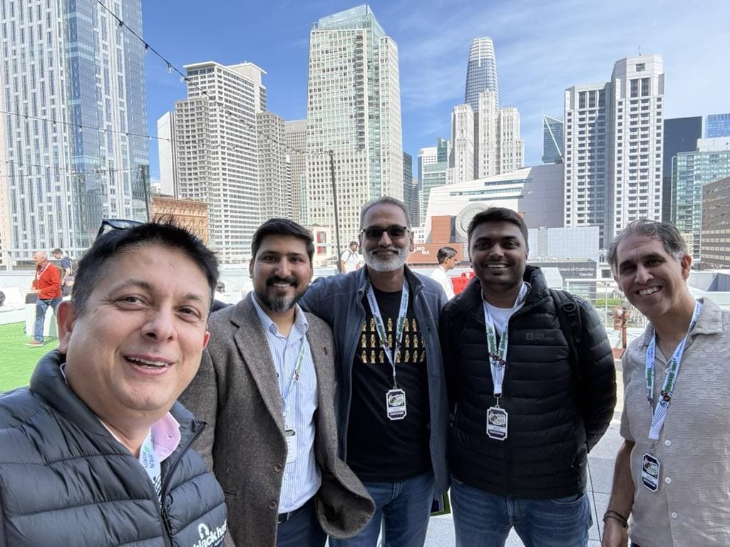 Aruneesh Salhotra with colleagues on a San Francisco rooftop during RSAC 2026 week