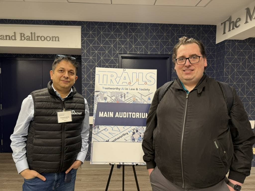Aruneesh Salhotra with a colleague at TRAILSCon 2026