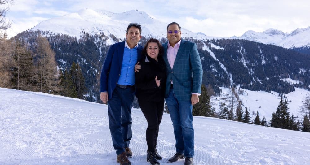 Aruneesh Salhotra with two colleagues in Davos