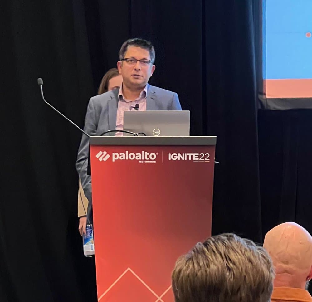 Aruneesh Salhotra speaking at the Palo Alto Networks Ignite 22 podium